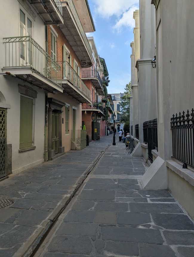 A narrow stone street.