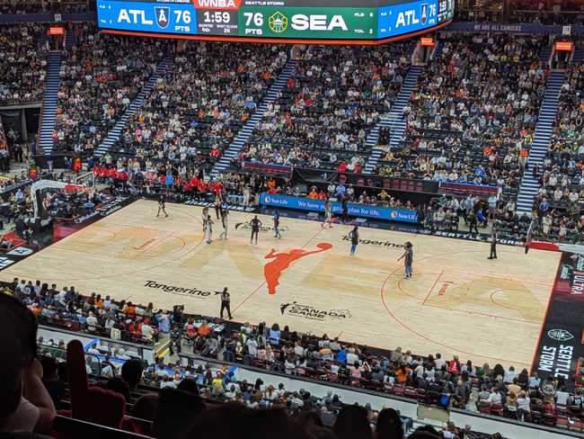 Players standing around on the court.