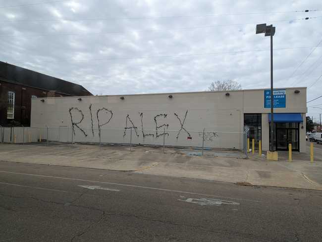 "RIP Alex" spray painted on a wall.