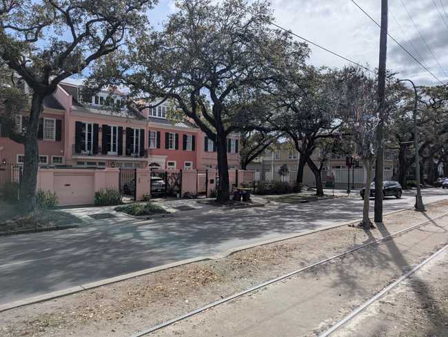 A few large houses on a boulevard.