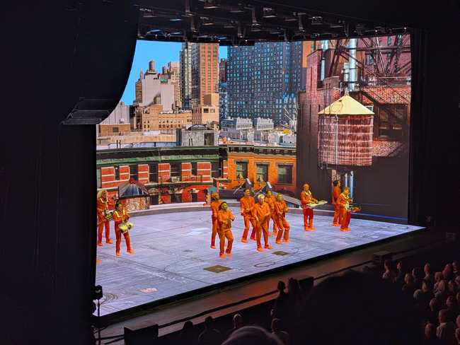 Now the walls and floor make it look like they're on top of a roof in New York City.